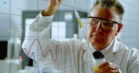 Image of financial data processing over caucasian male scientist in laboratory Stock Photos