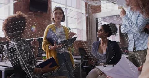 Image of financial data processing over diverse colleagues having meeting in Stockfoto's