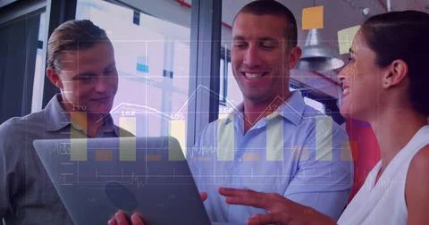 Image of financial data processing over diverse female colleagues discussing Stock Photos