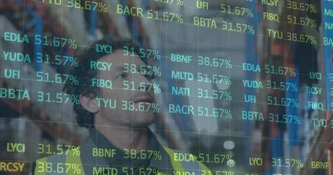 Image of financial data processing over man working in warehouse Stock Photos
