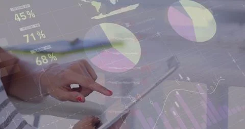 Image of financial data processing over businesswoman using tablet 写真素材