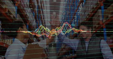 Image of financial data processing over diverse business people in warehouse Foto stock