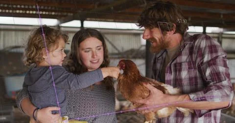 Image of financial data processing over caucasian family holding chicken Stock Photos