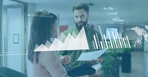 Image of financial data processing over diverse business people working at Stock Photos