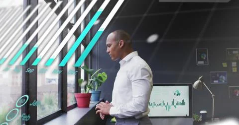 Image of financial data processing over businessman in office Stock Photos