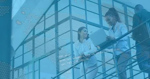 Image of financial data processing over diverse business people in office Stock Photos