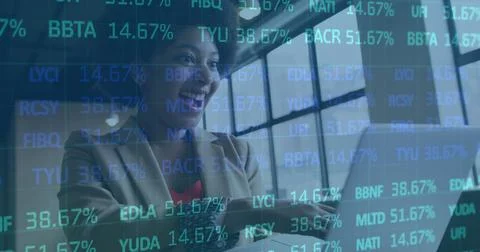 Image of financial data processing over african american businesswoman using Stock Photos