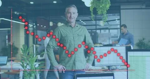 Image of financial data processing over diverse business people working at Stock Photos