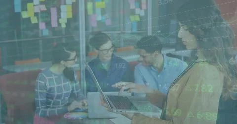 Image of financial data processing over diverse business people using computer Stock Photos
