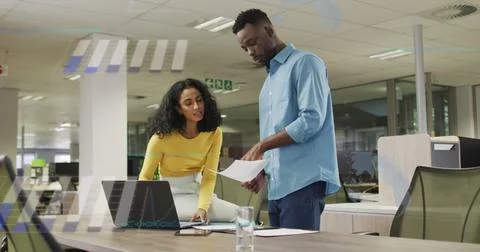 Image of financial data processing over diverse business people Stock Photos
