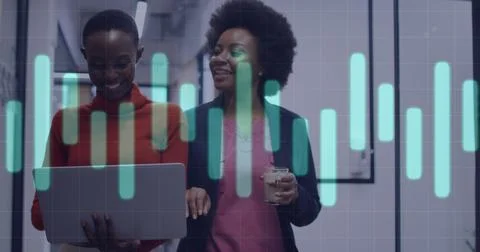 Image of financial data processing over african american businesswomen using Stock Photos