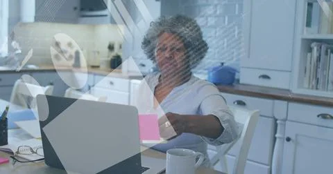 Image of financial data processing over senior african american woman using Stock Photos