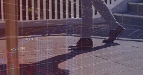 Image of financial data processing over man walking on stairs Stock Photos
