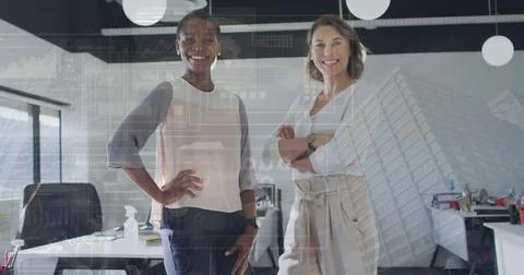 Image of financial data processing over businesswomen in office Stock Photos