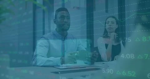 Image of financial data processing over diverse business people at meeting Stock Photos