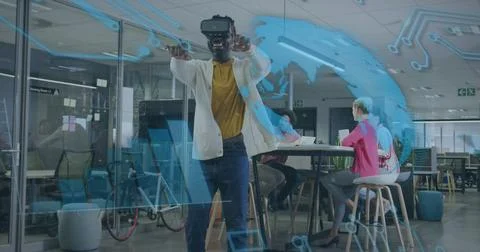 Image of financial data processing over african american businessman using vr Stock Photos