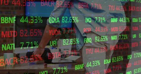 Image of financial data processing over businessmen using computer Stock Photos