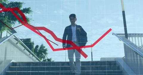 Image of financial data processing with red lines over asian businessman walking Stockfoto's