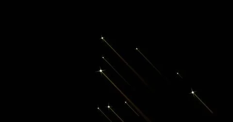 Image of fireworks exploding over black background Stock Illustration