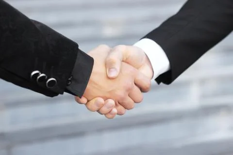 Image of a firm handshake Stock Photos