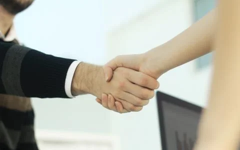 Image of a firm handshake Stock Photos