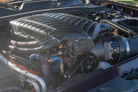 Image of Ford Mustang engine bay, open hood revealing high-performance compon Stock Photos