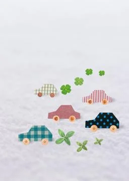 Image of four-leaf clovers and eco cars Stock Photos