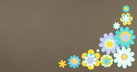Image frame background of blooming paper flowers on a colored background. Stock Photos