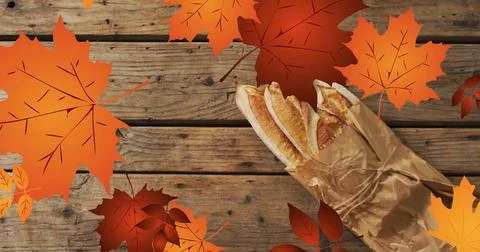 Image of frame with fall leaves over baguettes Stock Illustration