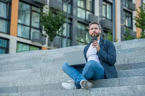 Image of freelancer man with computer. freelancer man with laptop outdoor Stock Photos