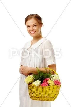 Image of fresh female holding basket with carnations Stock Photos