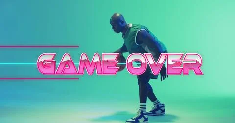 Image of game over text over neon pattern and african american basketball player Stock Photos