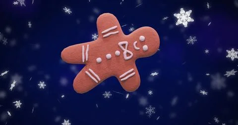 Image of ginger bread cookie over snow falling on blue background Stock Illustration