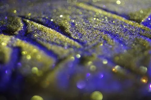 Image of glitter on black light background Stock Photos