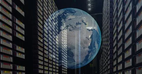 Image of a globe against computer server room Foto stock