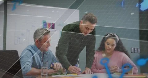 Image of globe and computer language over diverse coworkers discussing reports Stock Photos