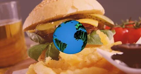 Image of globe icon over fast food with hamburger, chips and onion rings Stock Photos