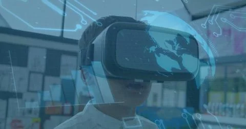 Image of globe spinning and processor elements over schoolboy wearing vr headset Stock Photos