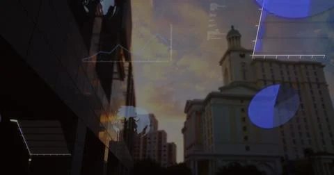 Image of globes, graphs, computer language over low angle view of buildings Stock Photos