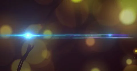 Image of glowing blue light over yellow light spots Ilustração Stock