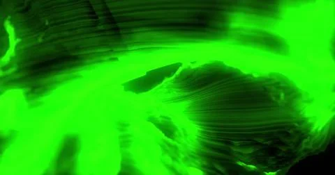 Image of glowing green light trails moving on seamless loop on dark background Illustrazione stock
