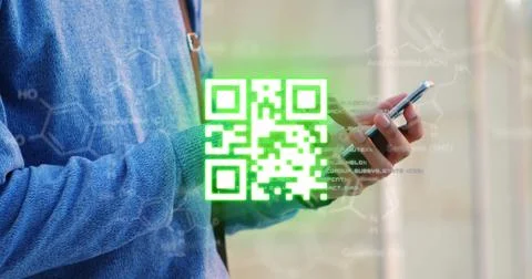 Image of glowing green QR code with data processing over man using smartphone in 스톡 사진