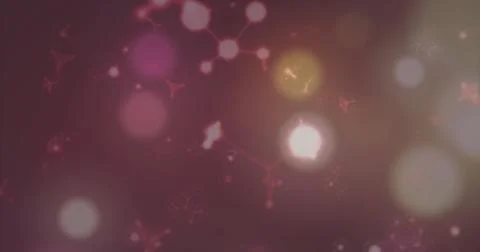 Image of glowing light spots moving on seamless loop on dark background Foto stock