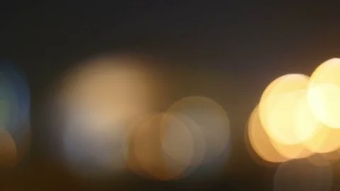 Image of golden bokeh balls created by city traffic illumination. Stock Footage 83643870