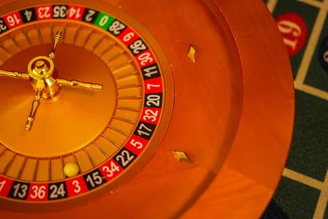 Image of a golden roulette wheel Stock Photos