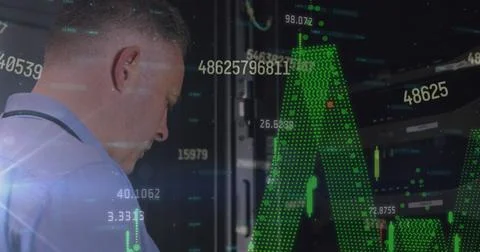 Image of graph and data processing over caucasian man working in computer server 스톡 사진