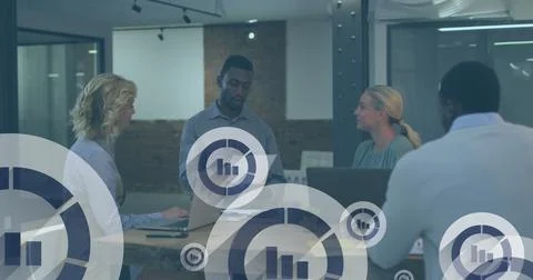 Image of graph icon in circles over diverse coworkers discussing reports in Stock Photos