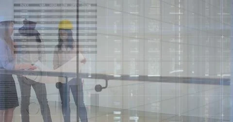 Image of graphs and charts processing data over diverse architects discussing 写真素材