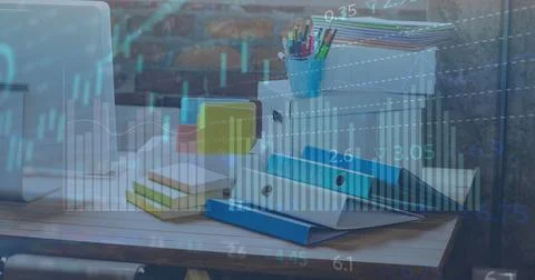 Image of graphs and charts processing data over stationery and computer on Foto stock