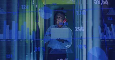 Image of graphs and data over asian man in server room Foto stock